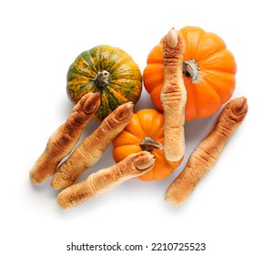 Pumpkins With Halloween Cookies On White Background