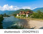 Punakha Dzong nestled in between the Mo Chhu and Pho Chhu rivers in a beautiful valley in Bhutan along the river. 