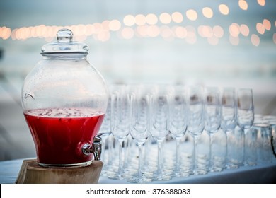 Punch Bowl And Champagne Glasses In The Party