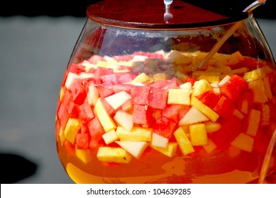 punchbowl with melon and pineapple