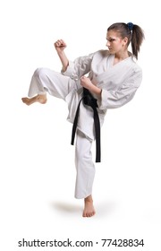punch.figure in the karate fighting stance on a white background.hand-to-hand fighting