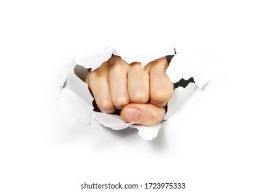 Punching Hole Through Paper Wall With Fist. Punch Break Through The Paper Wall. Fist Coming Out The Paper Hole Isolated On White Background