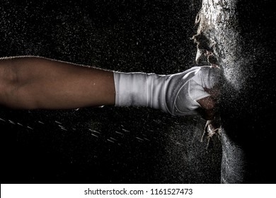 Punching sand bag - Shutterstock ID 1161527473