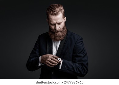 Punctual man checking time isolated on grey. Male accessory. Gentleman in bowtie late for meeting. Punctual man check time on watch being late. Elegant watch accessory