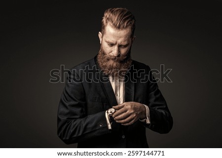 Punctual man checking time isolated on grey. Male accessory. Gentleman in bowtie late for meeting. Punctual man check time on watch being late. Elegant watch accessory