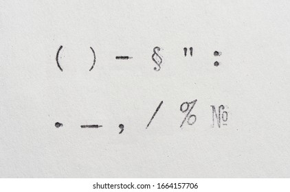 Punctuation Marks From Typewriter. Vintage Font On White Paper 