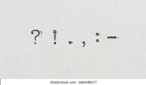 punctuation marks from typewriter. Vintage font on white paper 