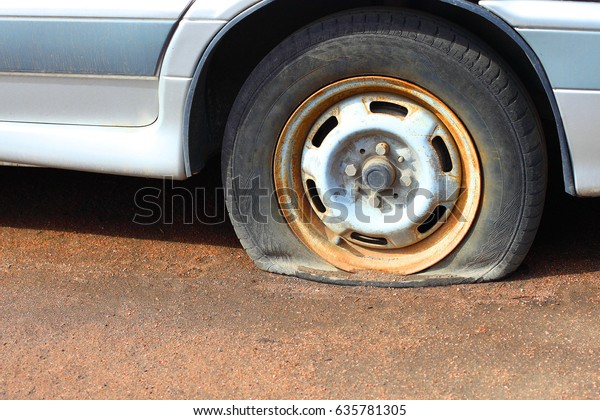 Punctured wheel in the\
car