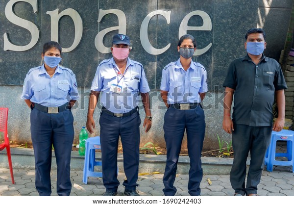Pune, India - April 01 2020: Security personnel wearing masks on duty on day 8 of the 21 day lockdown due to the coronavirus pandemic at Pune India.