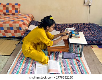 Pune,  India - July 16th, 2020 : Girl Student Pursuing Online Education Through Cell Phone  Due To Closed Schools On Account Of Spread Of Pandemic COVID-19, Corona Virus In City.