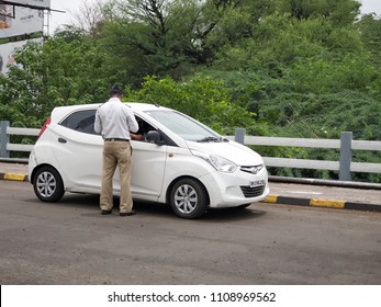 Pune, India- June 09 2018: Traffic policeman at work at Pune India.