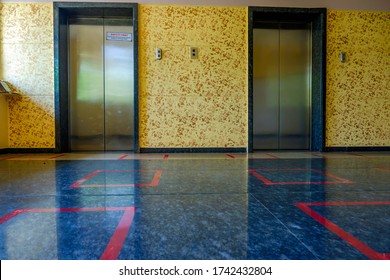 Pune, India - May 27 2020: Social Distancing Markings On The Floor In Front Of Elevators At An Office Complex At Pune India.