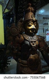 PUNE, INDIA - OCT 2, 2017 - Wooden Warrior Spirit Guarding Doorway, Raja Dinkar Kelkar Museum, Pune, India