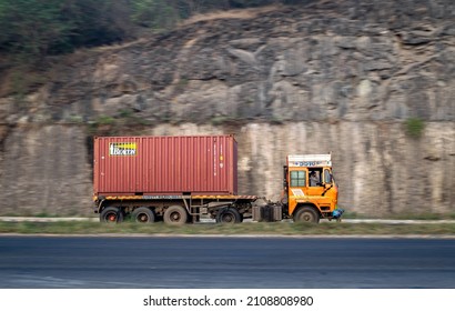 Pune, Maharashtra, India - January 1st, 2022 : Big Container On Trailer , Speeding Towards Mumbai On Highway.