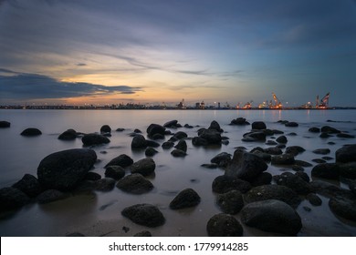 Punggol Beach in Singapore with rocks during Sunset