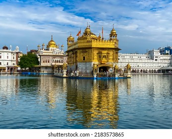 Punjab Tourism Golden Temple Shri Darbar Sahib Amritsar Punjab India with detailed defined cloudy blue skies - Shutterstock ID 2183573865