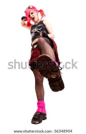 Punk girl wants to trample you. Isolated over white background. Focus to sole.