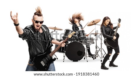 Punk rock band with female drummer and male and female guitarists isolated on white background