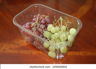 Punnet Of Grapes On A Coffee Table