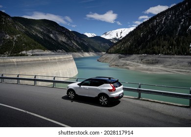 Punt dal Gall, Switzerland - May 2021: Volvo XC40 Recharge crossing the Dam