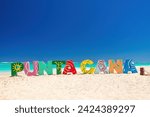 Punta Cana Bavaro beach resort and color letters on the sea sand, summer tropical caribbean vacation