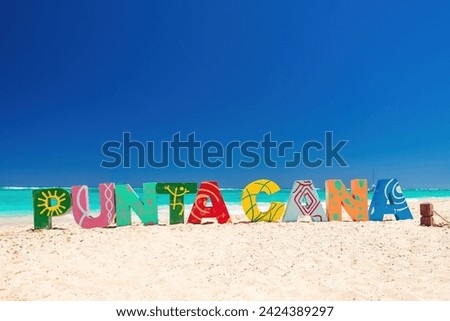 Punta Cana Bavaro beach resort and color letters on the sea sand, summer tropical caribbean vacation