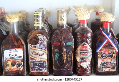 PUNTA CANA, DOMINICAN REPUBLIC - DECEMBER 31, 2018: Mamajuana Souvenir Bottles In Punta Cana. Mamajuana Is A Home Made Aphrodisiac Drink Made From Medicinal Roots In Dominican Republic 