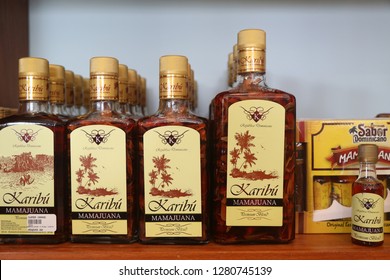 PUNTA CANA, DOMINICAN REPUBLIC - DECEMBER 31, 2018: Mamajuana Souvenir Bottles In Punta Cana. Mamajuana Is A Home Made Aphrodisiac Drink Made From Medicinal Roots In Dominican Republic 