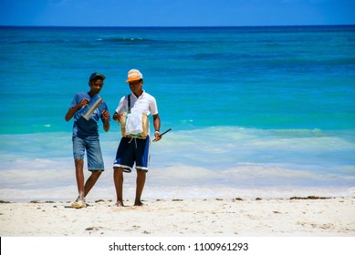 Punta Cana, Dominican Republic - September 16, 2014: Boys Playing Music On The Beach Of Punta Cana