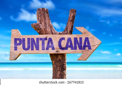 Punta Cana Wooden Sign With Beach Background