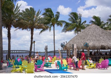 Punta Gorda, Florida - May 2021: Colorful Chairs At Tiki Bar