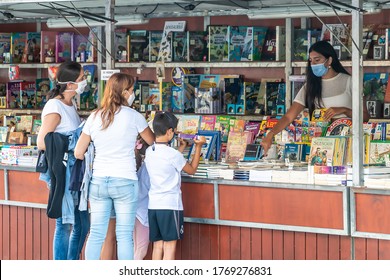 Punta Umbria, Huelva, Spain - July  3, 2020: Unidentified People Wearing Protective Facial Mask In Punta Umbria Annual Book Market Fair