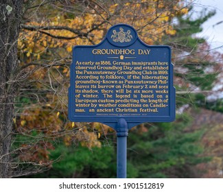 Punxsutawney, PA Oct 24, 2020:  Groundhog Day sign. sign discussing the origins of February 2 tradition of a woodchuck predicting weather
