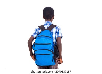 Pupil In Checkered Shirt Standing On White Background Wearing Backpack While Facing Back To Camera.