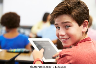 Pupil In Class Using Digital Tablet