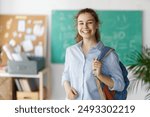 Pupil of secondary school. Girl with backpack indoors. Beginning of lessons. First day of fall.  