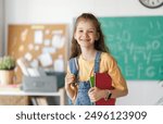 Pupil of secondary school. Girl with backpack indoors. Beginning of lessons. First day of fall.  