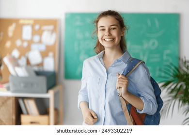 Pupil of secondary school. Girl with backpack indoors. Beginning of lessons. First day of fall.   - Powered by Shutterstock