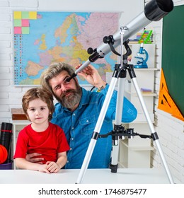 Pupil Watching Stars With A Teacher. Astronomy Telescope. Father Teaching Son