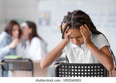 Pupils Bullying African-American Girl At School. Stop Racism