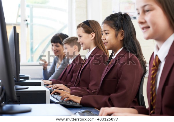 Pupils In Computer Class\
With Teacher
