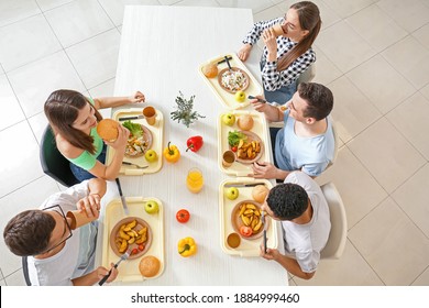 Pupils having lunch at school canteen - Powered by Shutterstock