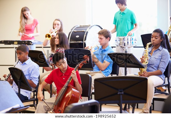 Pupils\
Playing Musical Instruments In School\
Orchestra