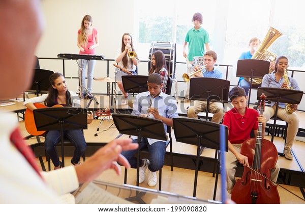 Pupils\
Playing Musical Instruments In School\
Orchestra