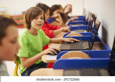 Pupils Sitting At The Computer Science Lesson