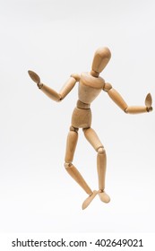 Puppet manipulation/Person represented by a wooden dummy being manipulated as a puppet with invisible strings. - Shutterstock ID 402649021