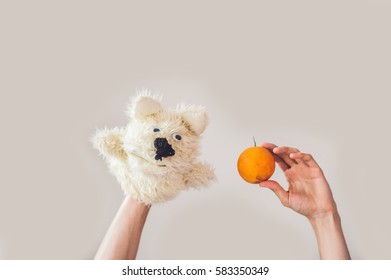 Puppet Show Dog On A Gray Background. Space For Text Or Replicas.