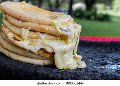 pupusas with melted cheese, pupusas typical Salvadoran food. close up - Shutterstock ID 1803502444