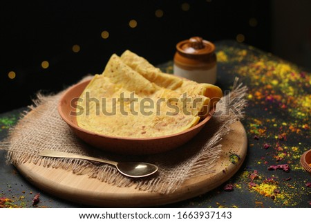 Puran Poli is a famous Holi Snack in india, served in Earthen platter. (Holi Concept)