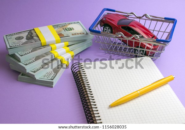 purchase auto dealership and rental car concept. red
car money shopping
cart